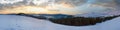 Mountain ridge sunrise panorama view with moon and sun. Drahobrat Ski Resort, Yasenja villadge, Carpathians, Ukraine