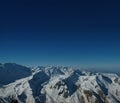 Mountain ridges against the infinite sky