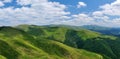Mountain ridges covered with meadows Royalty Free Stock Photo