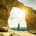 Mountain Ring in Kislovodsk, Russia. Scenic view of hiker, peak, sky and sun