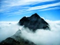 Mountain Rising From The Fog