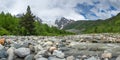 Mountain river Adishtchala flowing from glacier Lardaad on mount Tetnuldi Royalty Free Stock Photo