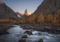 Mountain river on the background of autumn landscape