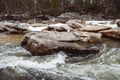 Mountain river on background of rocks and forest. Forest river water landscape. Wild river in mountain forrest panorama. Place for