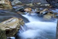 Mountain river with blured water close up Royalty Free Stock Photo