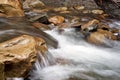 Mountain river with blured water close up Royalty Free Stock Photo