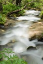 Mountain river falling and flowing trough stone