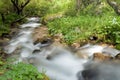 Mountain river falling and flowing trough stone