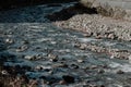 Mountain river, fast flow of water among stones Royalty Free Stock Photo