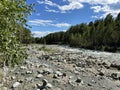 Mountain river flowing in a valley in a forest, Buryatia, Russia