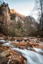 Mountain river in a gorge, blurred movement of water among rocky, landscape