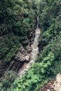 Mountain river in gorge, rock canyon with flowing water stream in summer time Royalty Free Stock Photo