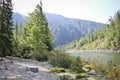 Mountain river landscape in Siberia - stream of a mountain river running between mountains in summer. Royalty Free Stock Photo