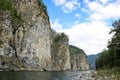 Mountain river landscape in Siberia - stream of a mountain river running between mountains in summer. Royalty Free Stock Photo