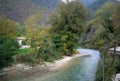 Mountain river in the middle of green forest in italy Royalty Free Stock Photo