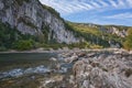 The mountain river with rapid current.