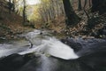 Mountain river with rapids in autumn forest Royalty Free Stock Photo