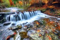 Mountain river with rapids and waterfalls at autumn time Royalty Free Stock Photo