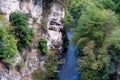 mountain river and rocks with green fresh plants Royalty Free Stock Photo