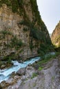 Mountain river between sheer cliffs . blue clear water of the river. Royalty Free Stock Photo