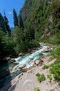 Mountain river between sheer cliffs . blue clear water of the river Royalty Free Stock Photo