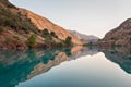 The mountain river is shrouded in mountains Royalty Free Stock Photo