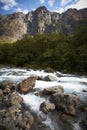 Mountain river skipping over the rocks Royalty Free Stock Photo