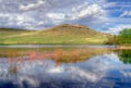 Mountain, river, sky. Russian steppe.