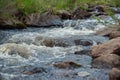 Mountain river, spray water runs over stones Royalty Free Stock Photo