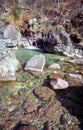 Mountain river. Stones and water of mountain river. The mountains are said Royalty Free Stock Photo