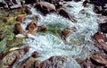 Mountain river. Stones and water of mountain river. The mountains are said Royalty Free Stock Photo