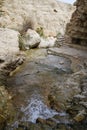 The mountain river with the tiny falls Royalty Free Stock Photo