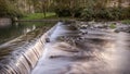 Mountain river waterfall. Beautiful natural background of stones and water. Long exposure. Visible river bank Royalty Free Stock Photo