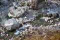 mountain river during winter lowland and small temporary bridge Royalty Free Stock Photo