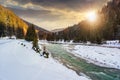 Mountain river in winter at sunset Royalty Free Stock Photo