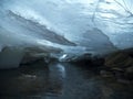 Under the Ice The mountain river in the winter at sunset in Ukraine Royalty Free Stock Photo