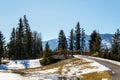 Mountain river with wooden bridge in early spring eastern british columbia canada