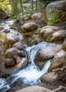 Mountain river in the woods, forest. Big rocks. Silky smooth flowing water. Vedauwoo National Park, Wyoming, USA