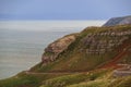 Mountain road along the ocean coast. Rocky sea shore Royalty Free Stock Photo