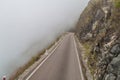 Mountain road in clouds