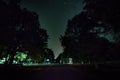 Mountain Road through the forest on a full moon night. Scenic night landscape of dark blue sky with moon. Azerbaijan. Long shutter Royalty Free Stock Photo