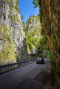 Mountain road in the gorge of the mountains near the city in Italy San Pelegrino