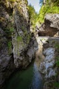 Mountain road in the gorge of the mountains near the city in Italy San Pelegrino