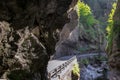 Mountain road in the gorge of the mountains near the city in Italy San Pelegrino