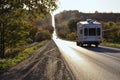 Mountain road. Landscape with autumn leaf color, and beautiful asphalt road in autumn. Travel background. Highway in mountains. Tr