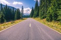 Mountain road. Landscape with rocks, sunny sky with clouds and b Royalty Free Stock Photo