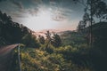 Mountain road. Landscape with rocks, sunny sky with clouds and beautiful asphalt road in the evening in summer. Royalty Free Stock Photo