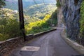 Mountain road that leads directly along a cliff Royalty Free Stock Photo