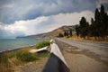Mountain road near the sea in the Crimean mountains in summer. Royalty Free Stock Photo