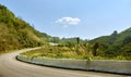 Mountain road in Northern Thailand in sunny weather. The road to the tea plantations at Doi Mae Salong. Chiang Rai Province Royalty Free Stock Photo